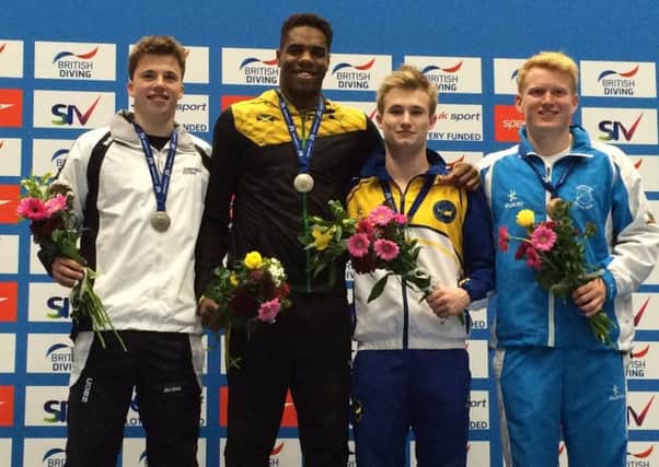 Freddie Woodward, left, after winning silver in the British 3m springboard championships at Ponds Forge. Photo: British Swimming