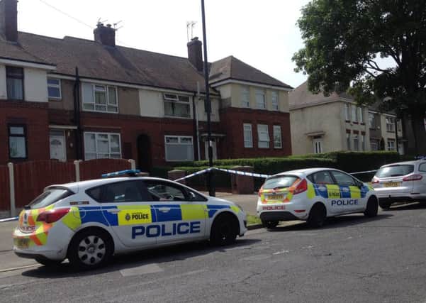 Police on Sicey Avenue, Shiregreen, after a man was shot during an armed raid
