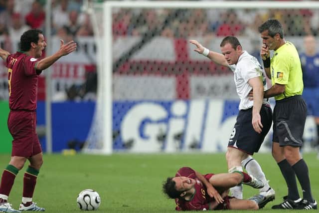 A red card for England's Wayne Rooney after the challenge  on Alberto Ricardo Carvalho.