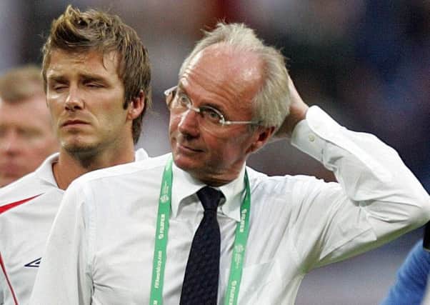 It's agony for departing coach Sven-Goran-Erikson and David Beckham, left, as England go out to Portugal in the quarter-final. Photos: PA Wire