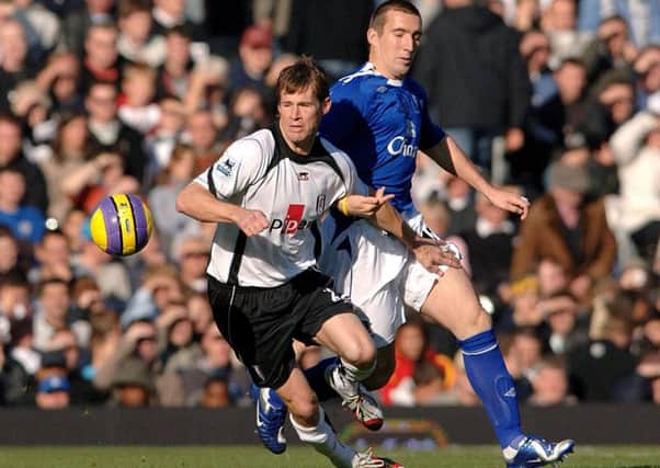 Alan Stubbs in Premier League action with Everton