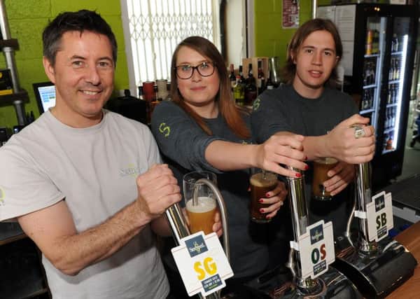 (l-r) Alex Barlow, owner, Anna Duszanskyj, head of retail and Louis Kempson-Saeton, apprentice brewer at the Sentinel Brewhouse. Picture: Andrew Roe