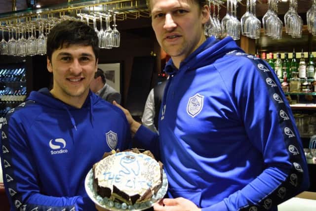 Supporting the Time For Tea campaign Shefield Wednesday players (left) Fernando Forestieri and Glenn Loovens