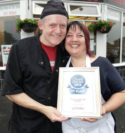 Third place in The Star's Chippy of the Year for 2016 Dykes Shoal Chippy on Dykes Hall Road. Pictured are Steve Mosley and Jo Ashton-Mosley. Photo: Chris Etchells