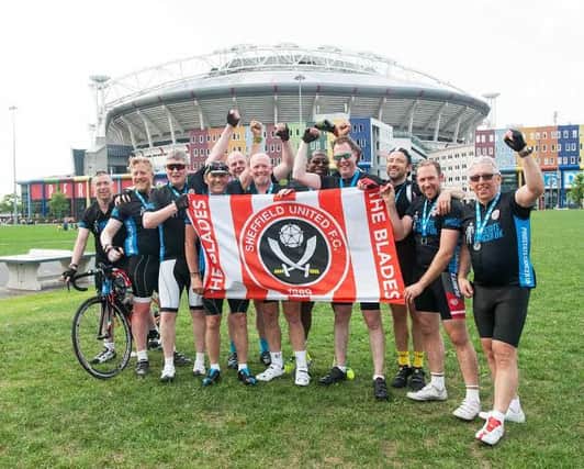 Some of the Tour de Blades team in Amsterdam as part  of their cycle ride.
