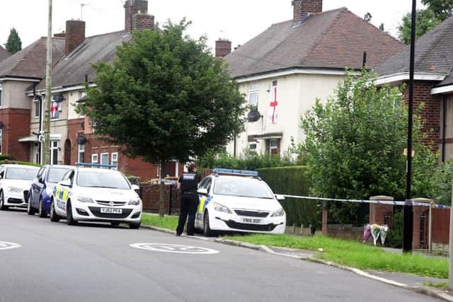 Police at the scene of the murder on Nether Shire Lane, Sheffield, United Kingdom, 19th June2016. Photo by Glenn Ashley.