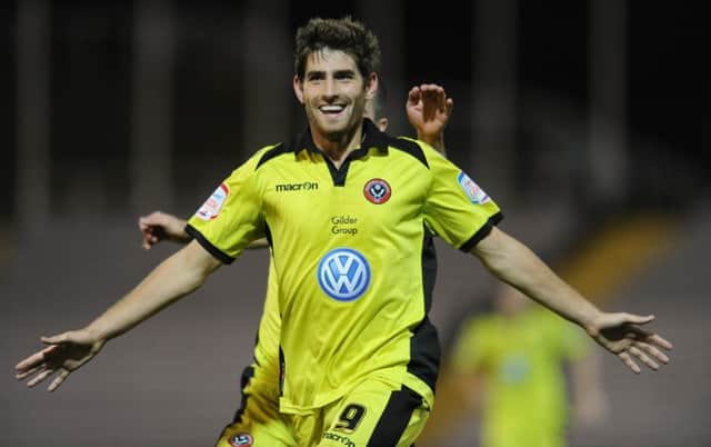 Ched Evans celebrates in his United days