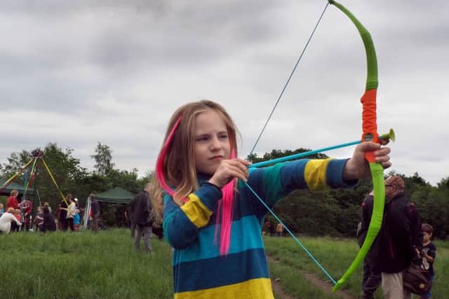 Robin Hood day on Wadsley Common: Paige Dowsett (7) tries her hand at archery