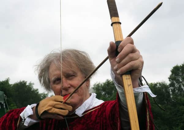 Robin Hood day on Wadsley Common: Archer Roy Atkinson with an English longbow