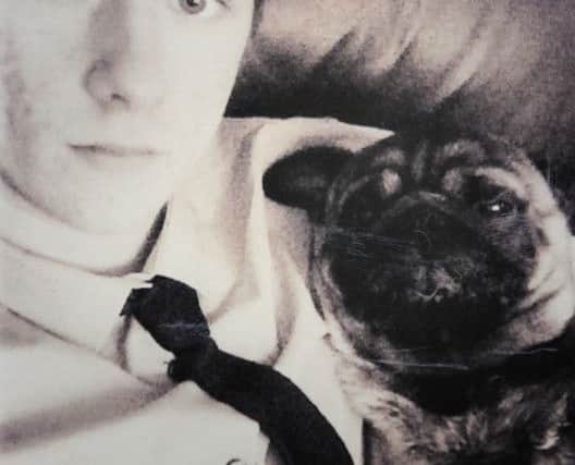 Adam with his pet pug Finley. Picture submitted.