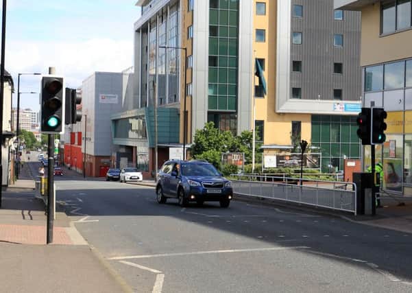 The scene of an accident on Bramall Lane near the crossing in Sheffield this morning.