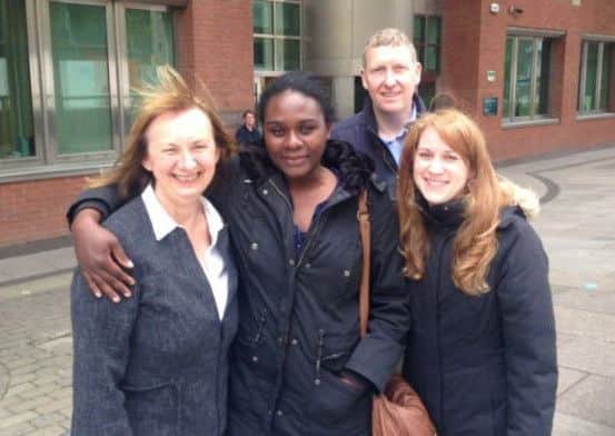 Linda Okungbowa with members of the Ark church outside Sheffield Crown Court