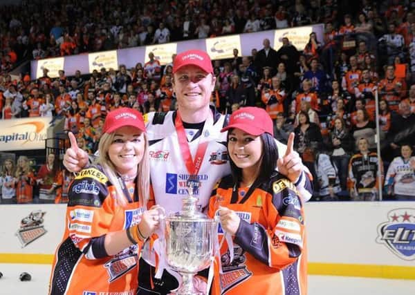 Amy Usher, left, with sister Beth and player Tim Spencer