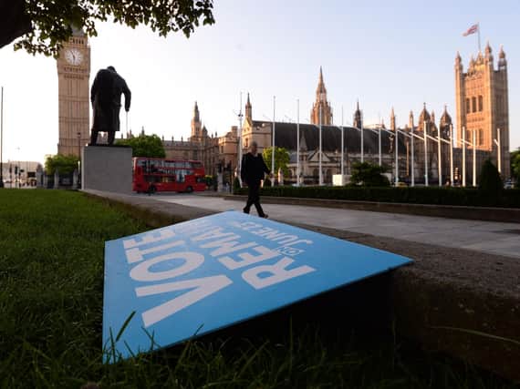A Vote Remain poster lies discarded on the ground in London's Parliament Square after the Leave campaign won the EU referendum campaign. Photo: PA