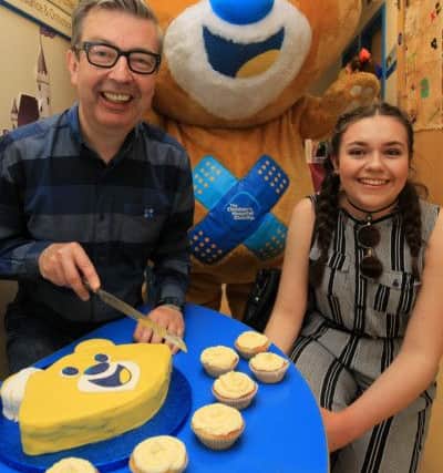 Bake it Better Day at Sheffield Children's Hospital with Howard Middleton a former contestant from the Great British Bake Off. Howard is pictured with Isobel Clark, 15. Photo: Chris Etchells