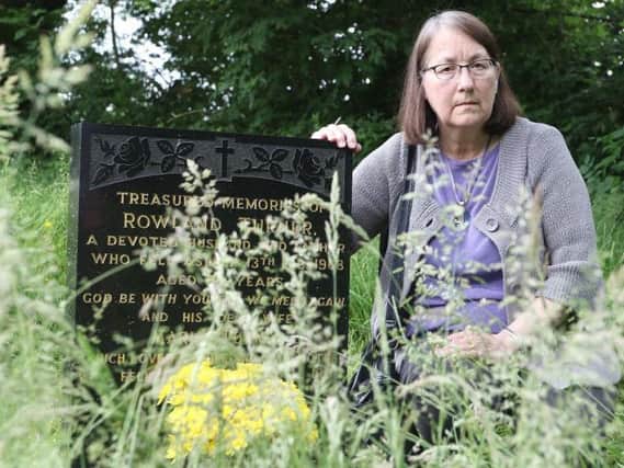 Rosemary Rotherham at her parents' final resting place. Picture by Jason Chadwick.