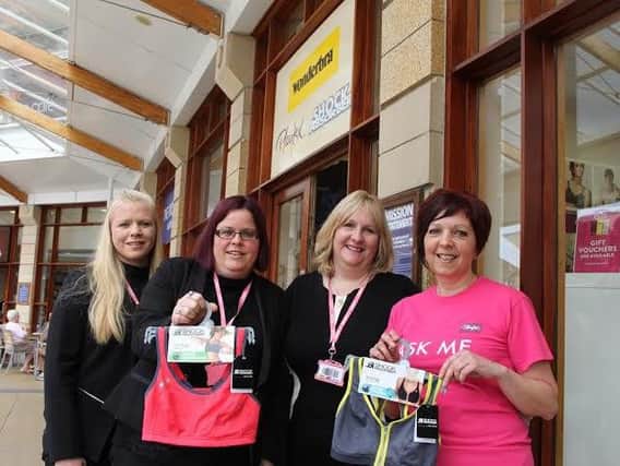 Store manager Tracey Murphy (second right) with her Lakeside Village Wonderbra/Platex store team