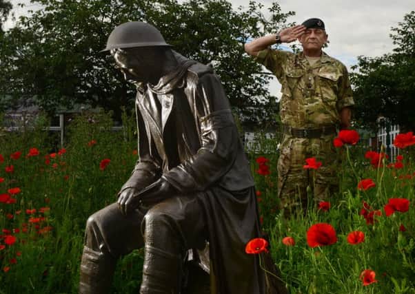 30 June 2016...Veteran Steve Green with The new Somme memorial statue, at the VC Museum in Doncaster, of rifleman Willy Colman who was awarded a WWI Victoria Cross . Picture Scott Merrylees