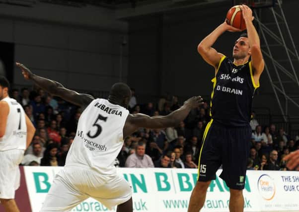 Sheffield Sharks' Mike Tuck scores against Manchester Giants. Picture: Andrew Roe