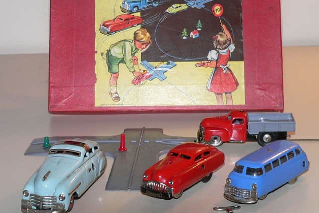 Distiler tin toys