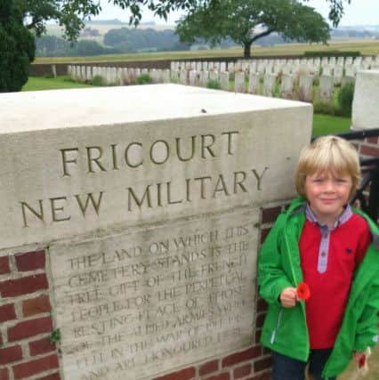 Oscar Varns, aged five, has been filmed reciting The Fallen, a poem about the Battle of the Somme. He is pictured at the Thiepval Memorial, in France.