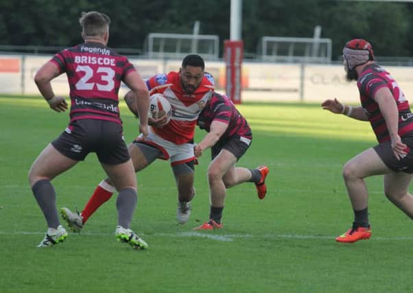 Quentin Laulu Togagae looks to break through the Oldham line for Sheffield Eagles. Picture: Simon Hall