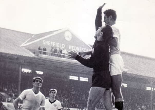 West Germany keeper Tilkowski goes up for a high with Rocha of Uruguay 
23rd July 1966 at Sheffield Wednesday's Hillsborough stadium
