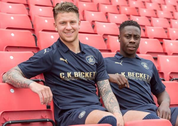 New Barnsley signings George Moncur and Andy Yiadom at Oakwell
