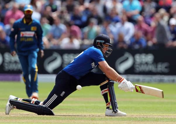 England's Joe Root reverse sweeps against Sri Lanka on Saturday.  Photo: Davies Davies/PA Wire.