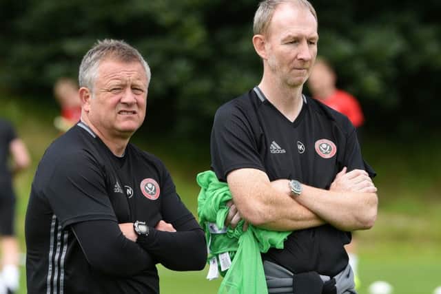 Chris Wilder and his assistant Alan Knill watched Wilson in training before offering him a contract