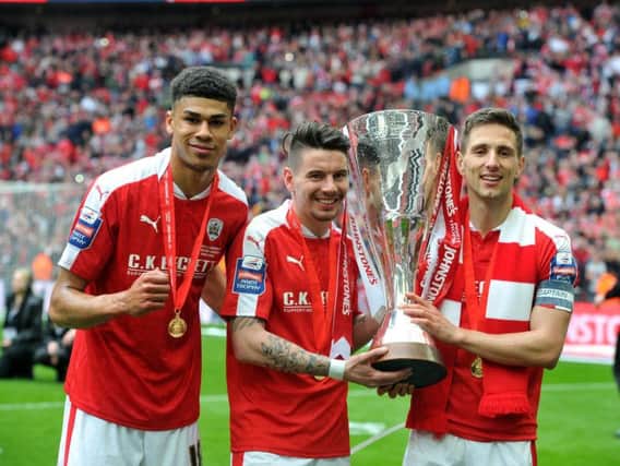 Ashley Fletcher, Adam Hammill and Conor Hourihane after Barnsley's Trophy win at Wembley last season