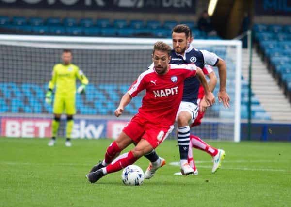Millwall vs Chesterfield - Angel Martinez brings the ball forward - Pic By James Williamson