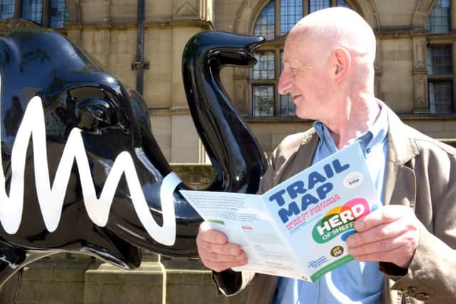Arctic Monkeys Elephant outside the Town Hall,  John Woolley studies the Herd trail map