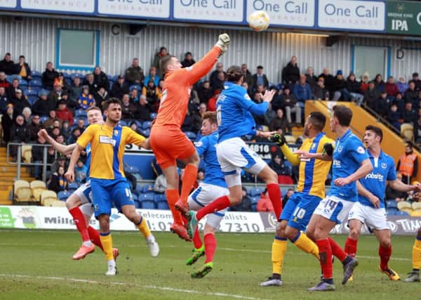 Mansfield Town v Portsmouth on Saturday March 19th 2016. Portsmouth keeper Ryan Fulton clears the ball. Photo: Chris Etchells