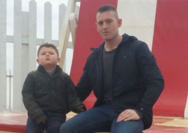 Chris Henchliffe and his son. Picture released by family.
