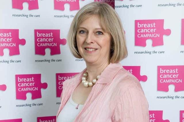 Blue to pink - Mrs May supporting Breast Cancer Campaign