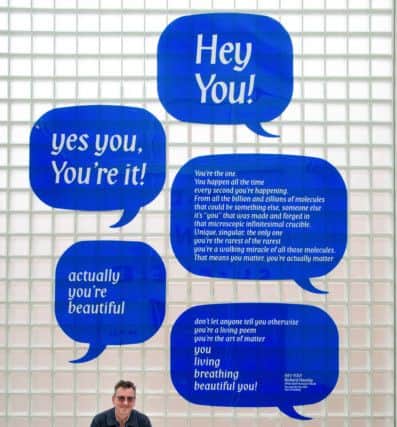 Richard Hawley unveils his poem, Hey You, at the Millennium Galleries in Sheffield as part of the Off the Shelf festival. Picture: Will Roberts