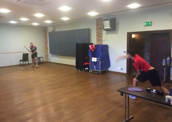 Improvised indoor cricket in the physio room