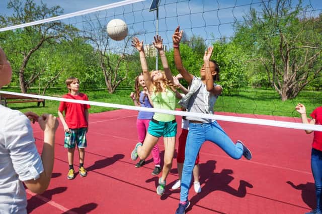 Playing with friends is a no-cost summer holiday option.