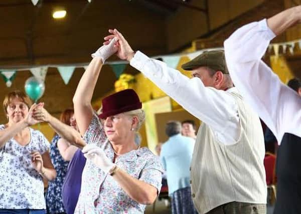 Celebrating the tea dance at a previous 1940s Wartime Weekend and Vintage Fayre.
