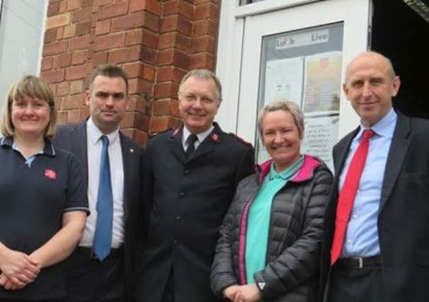 John Healey MP, right, with supporters of The Salvation Army.