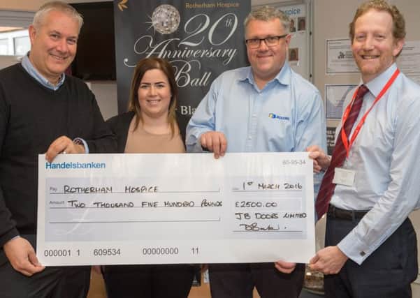 JB Doors present a cheque for Â£2500 to rotherham Hospice
L to R Darren Baker (Chairman), Kim Wordsworth, Andy Marshall (MD) and Christoper Duff Chief executive of Rotherham Hospice