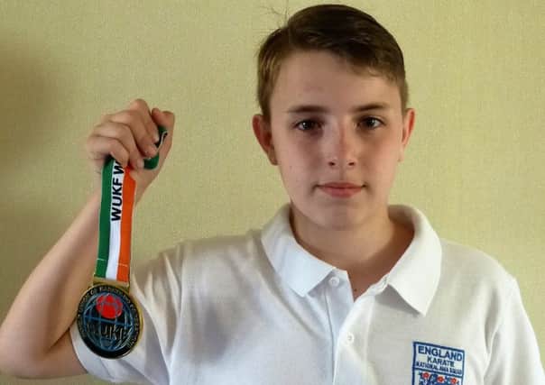 Sam Collinson has t been crowned world champion at the World Union of Karate Federations  World Championships in Dublin.