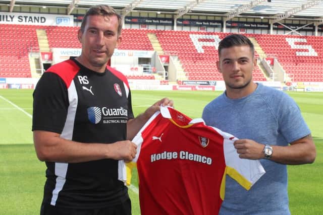 Jake Forster-Caskey with Millers boss Alan Stubbs