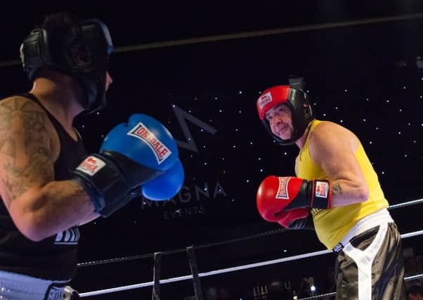 Steven Haywood, 60, from Gleadless Valley, takes part in the 1st Class White Collar Boxing event at Magna in aid of Bluebell Wood Children's Hospice. Photo: Sammy Lam
