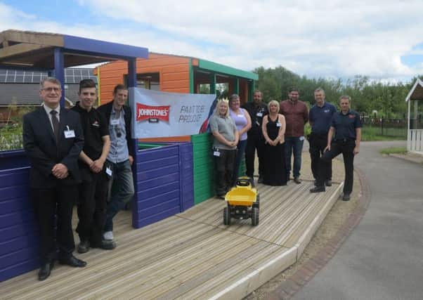 The train is officially launched at Bluebell Wood (from left: Andrew Chambers, Liam Benton, Ryan Badger, Natalie Fountain, Catherine Dye, Graham Drury, Kelly Johnston, Neil Jones, Lee Shaw, Andrew Drury