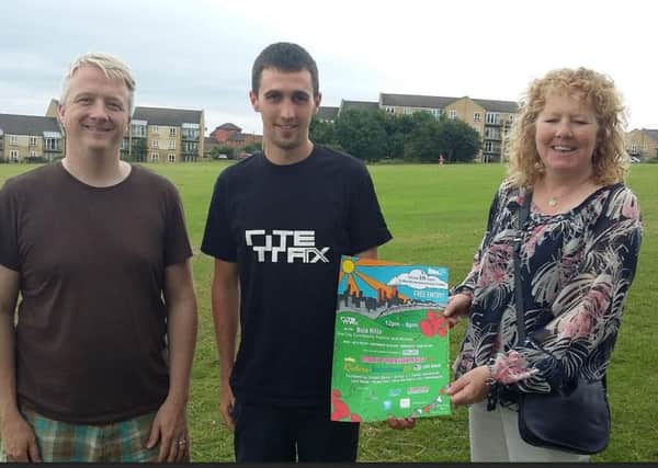 On the Bole Hills - Coun Craig Gamble Pugh with Joe Gaughan, from RiteTrax, and Coun Anne Murphy with a festival poster