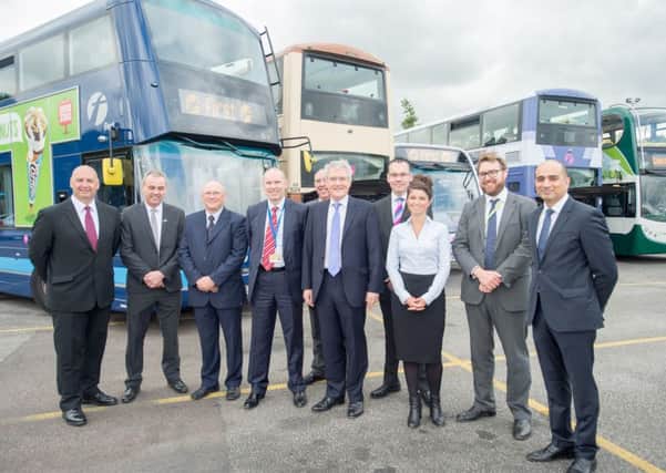 Transport Minister Andrew Jones on a visit to the First Bus Depot in Sheffield