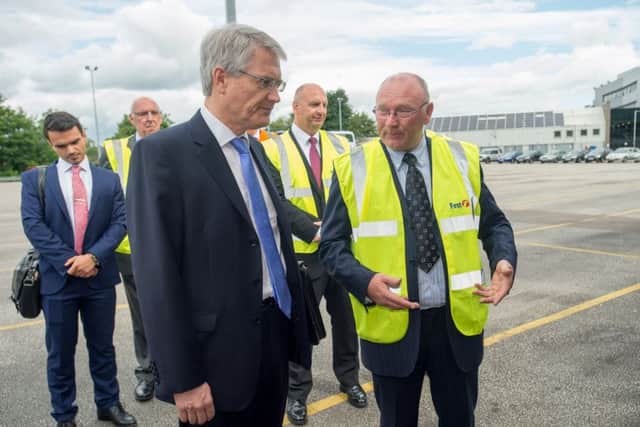 Transport Minister Andrew Jones on a visit to the First Bus Depot in Sheffield