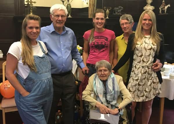 Frances Furniss surrounded by her family as she celebrates her 105th birthday